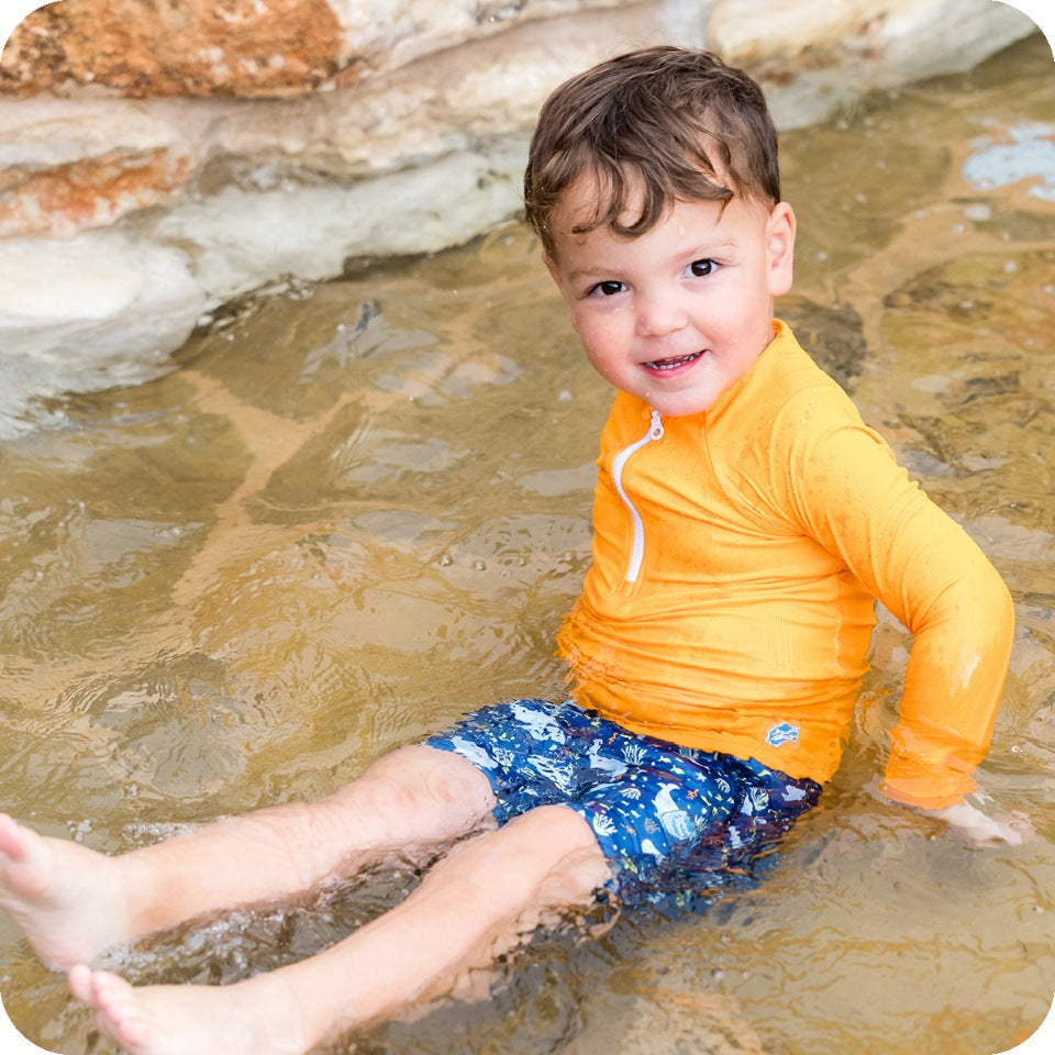 Outdoor Swimming With Kids: What to Wear for Sun, Wind and Cooler Water