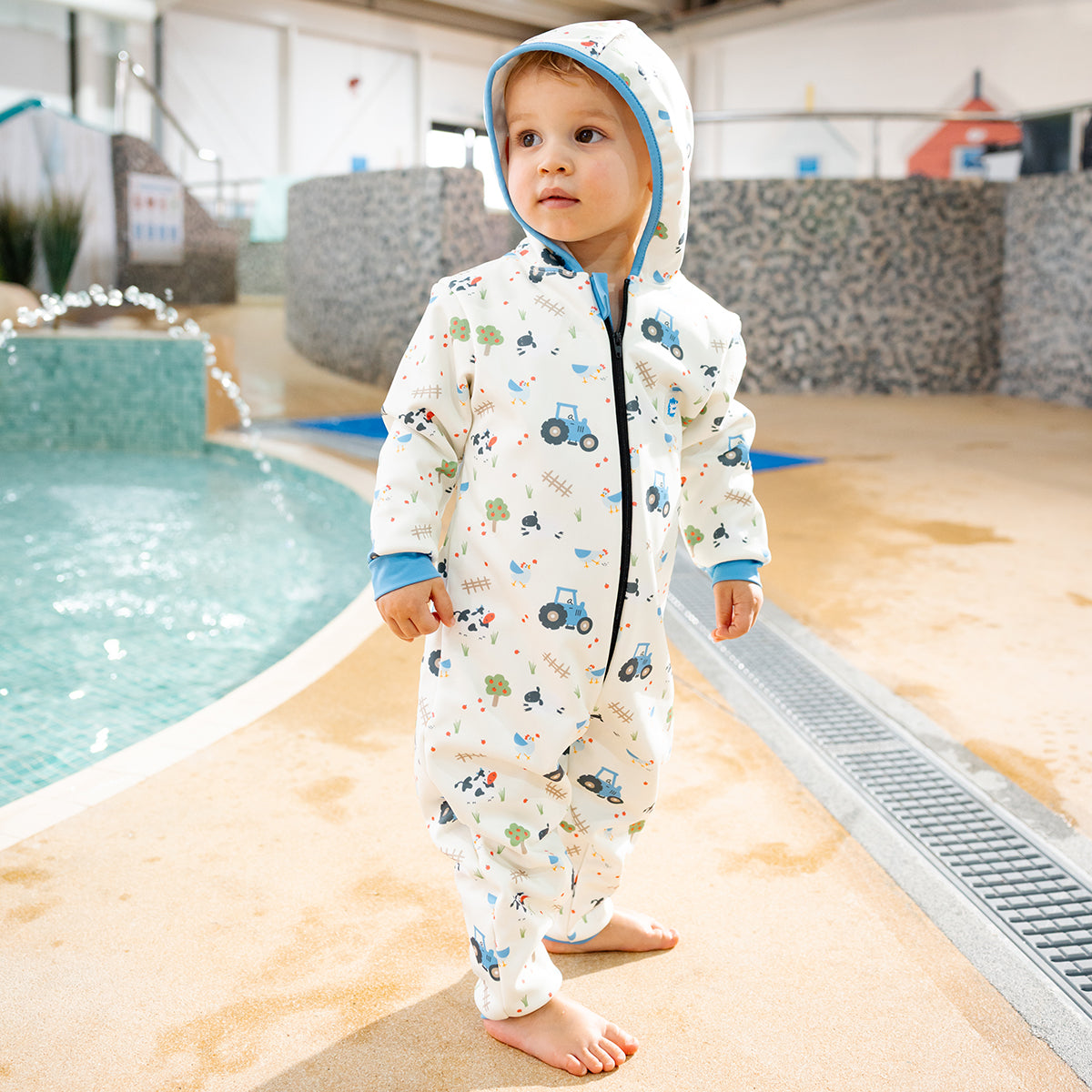 Nach dem Schwimmen wasserdichter Onesie „Traktorgeschichten“